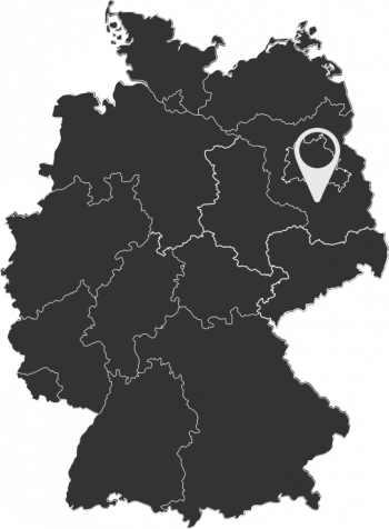 eine dunkle Deutschlandkarte auf welcher der Firmenstandort von Mein Montageteam im Süden von Berlins vermerkt ist